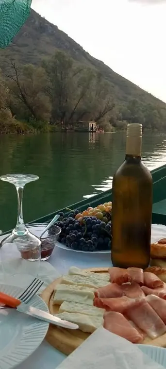 Drinks and snacks on the boat at dusk