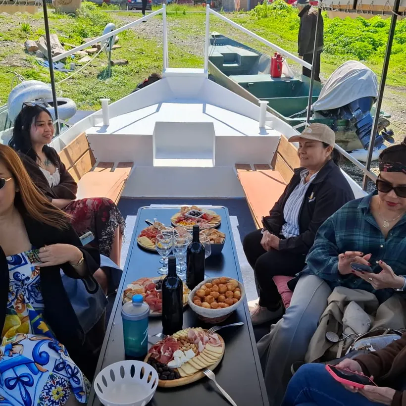 Friends smiling together on the boat